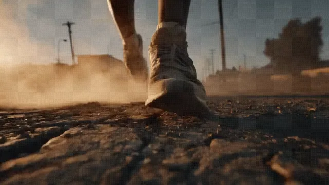 AI photo animation reference of sneakers walking along a dusty road